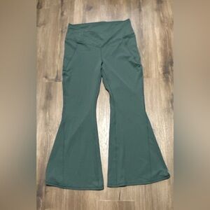 Fabletics PureLuxe Dark Green Crossover Flare Leggings